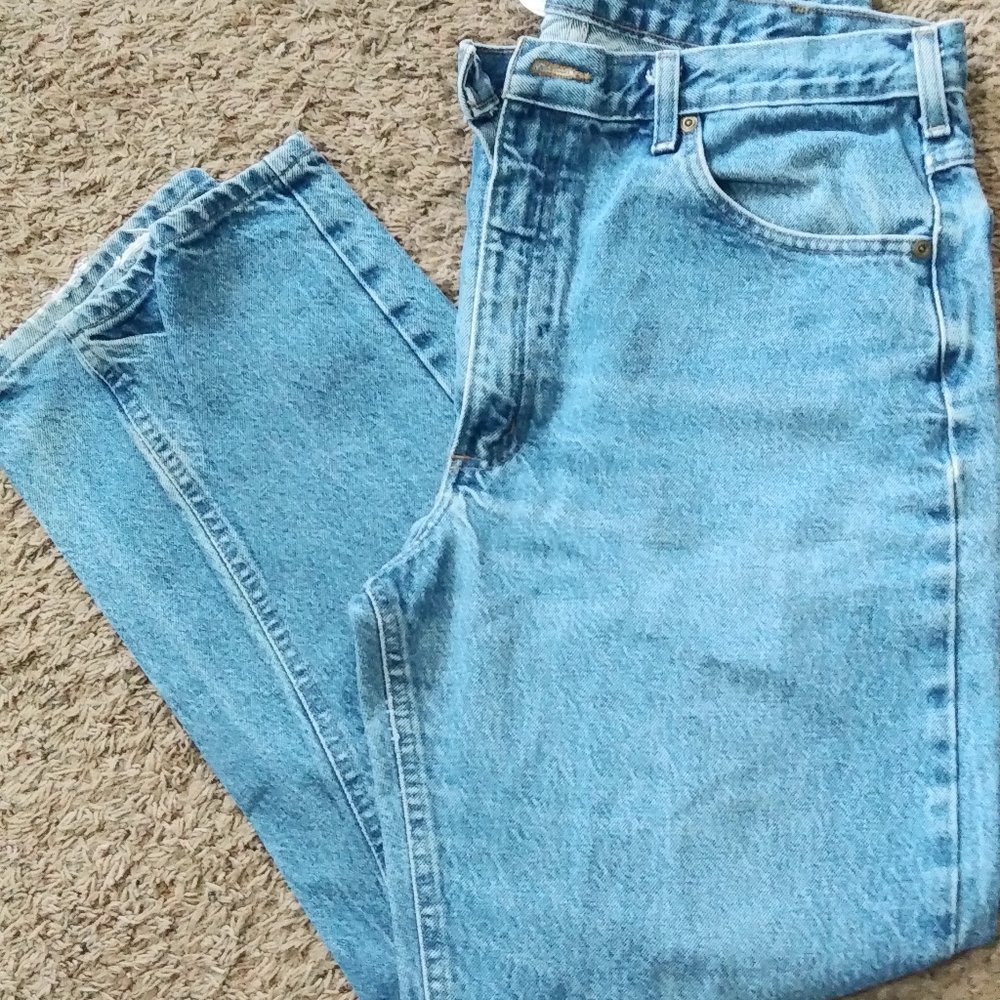 Men's Carhart blue Jeans Size 38 x 32. Relaxed fit. Some gray on hem.